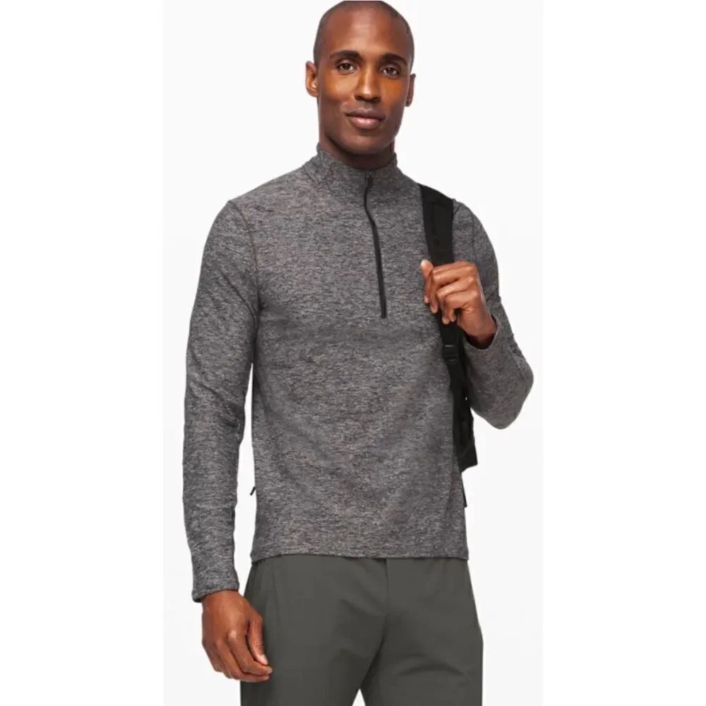 Lululemon Surge Warm 1/2 Zip Size L
Heathered Black